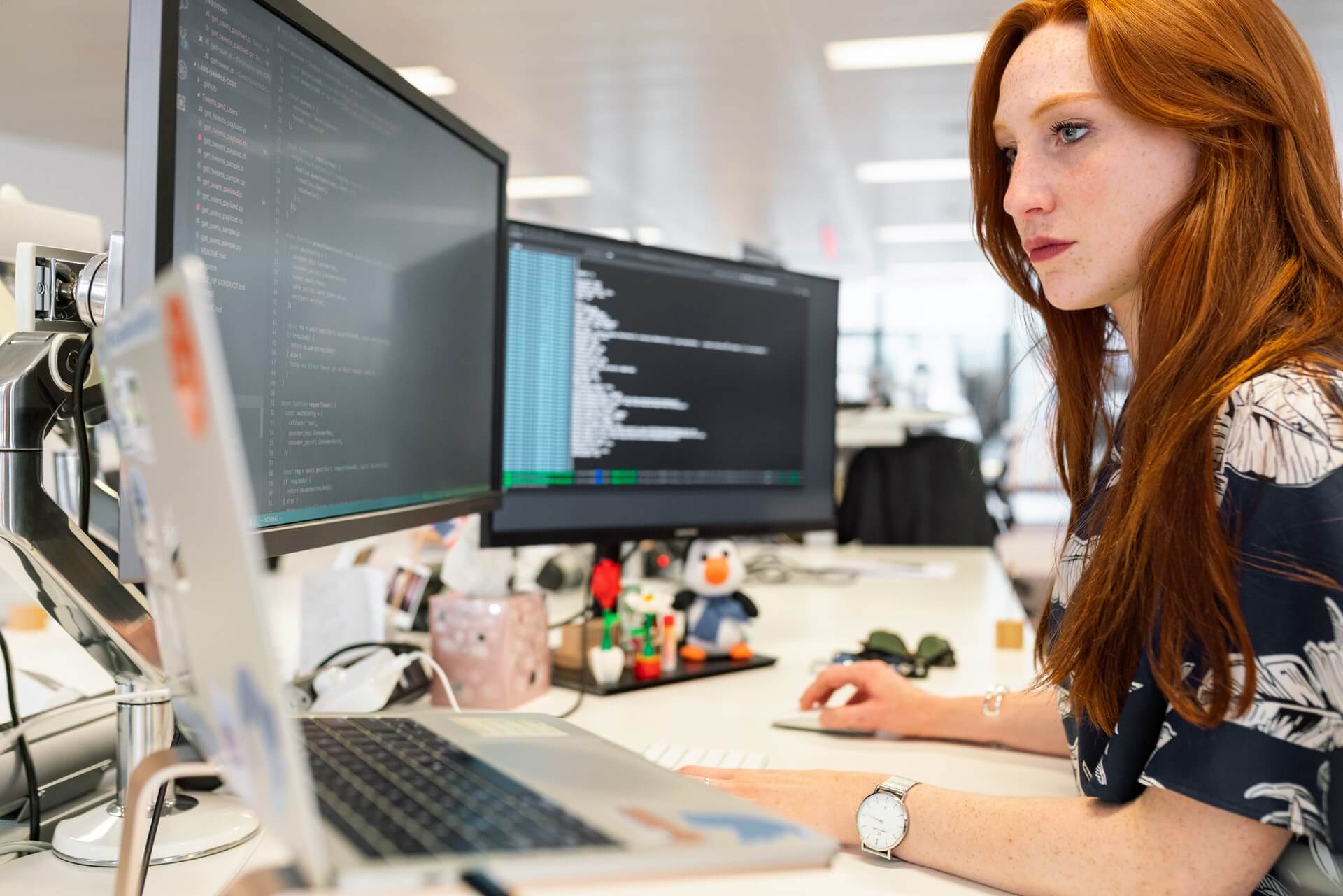 Image of a woman sitting at desk